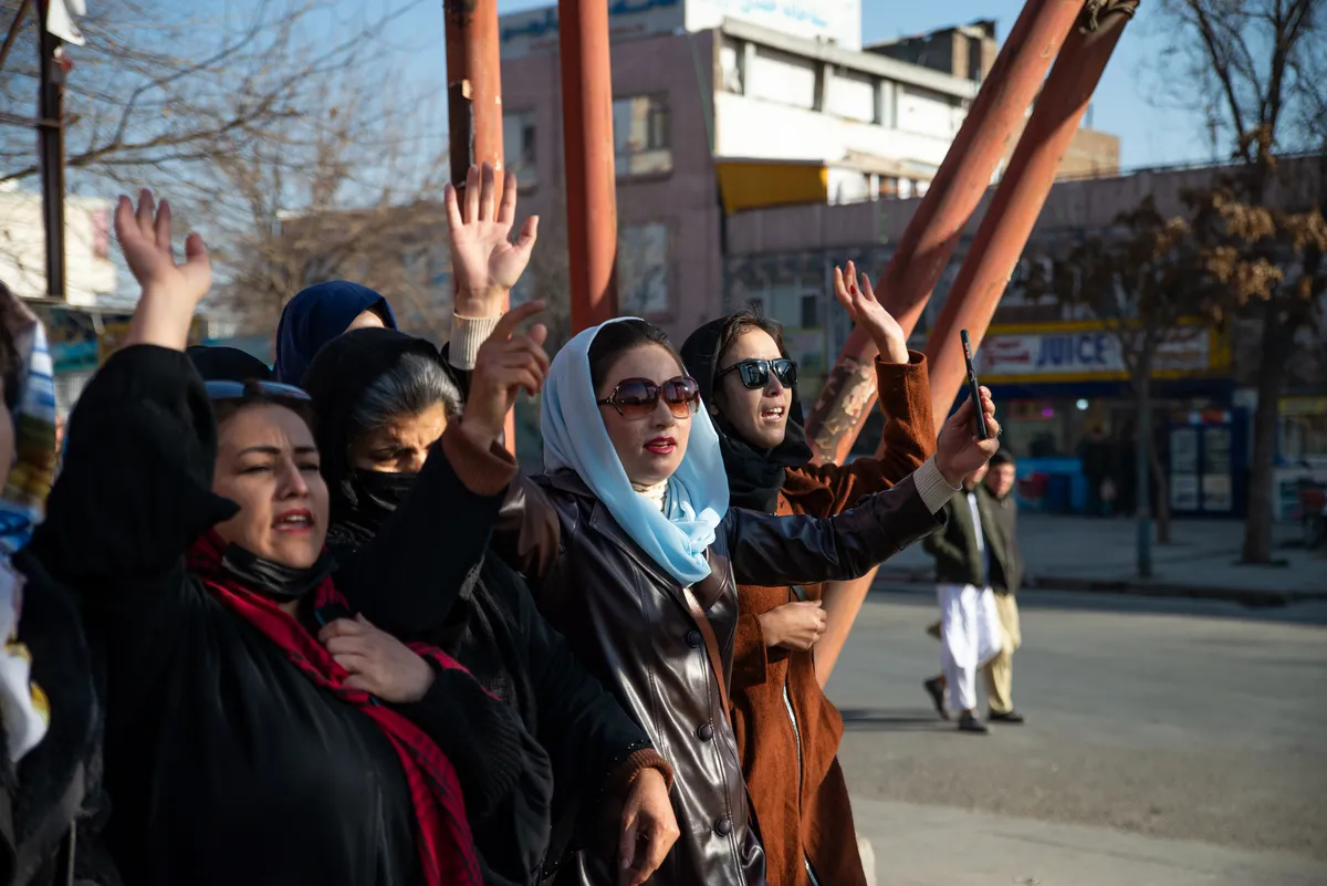 Afghan women protest against new Taliban ban on women accessing University Education on December 22, 2022 in Kabul, Afghanistan. Photo by Stringer/Getty Images