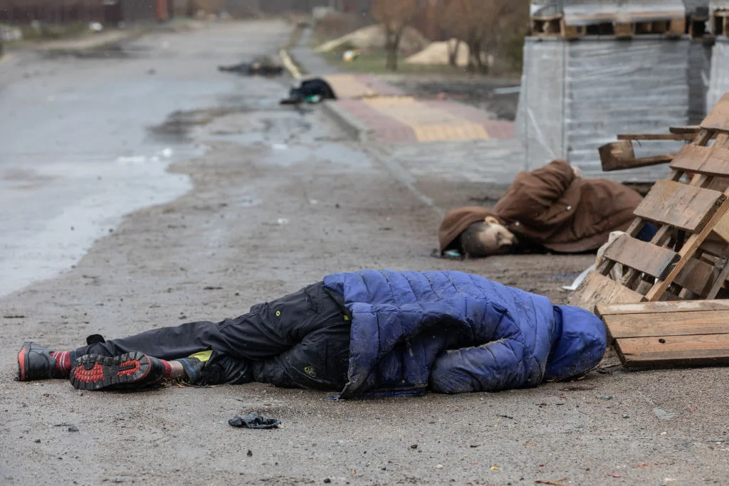 Убитые местные жители в Буче. Фото: Mykhaylo Palinchak/SOPA Images/LightRocket via Getty Images