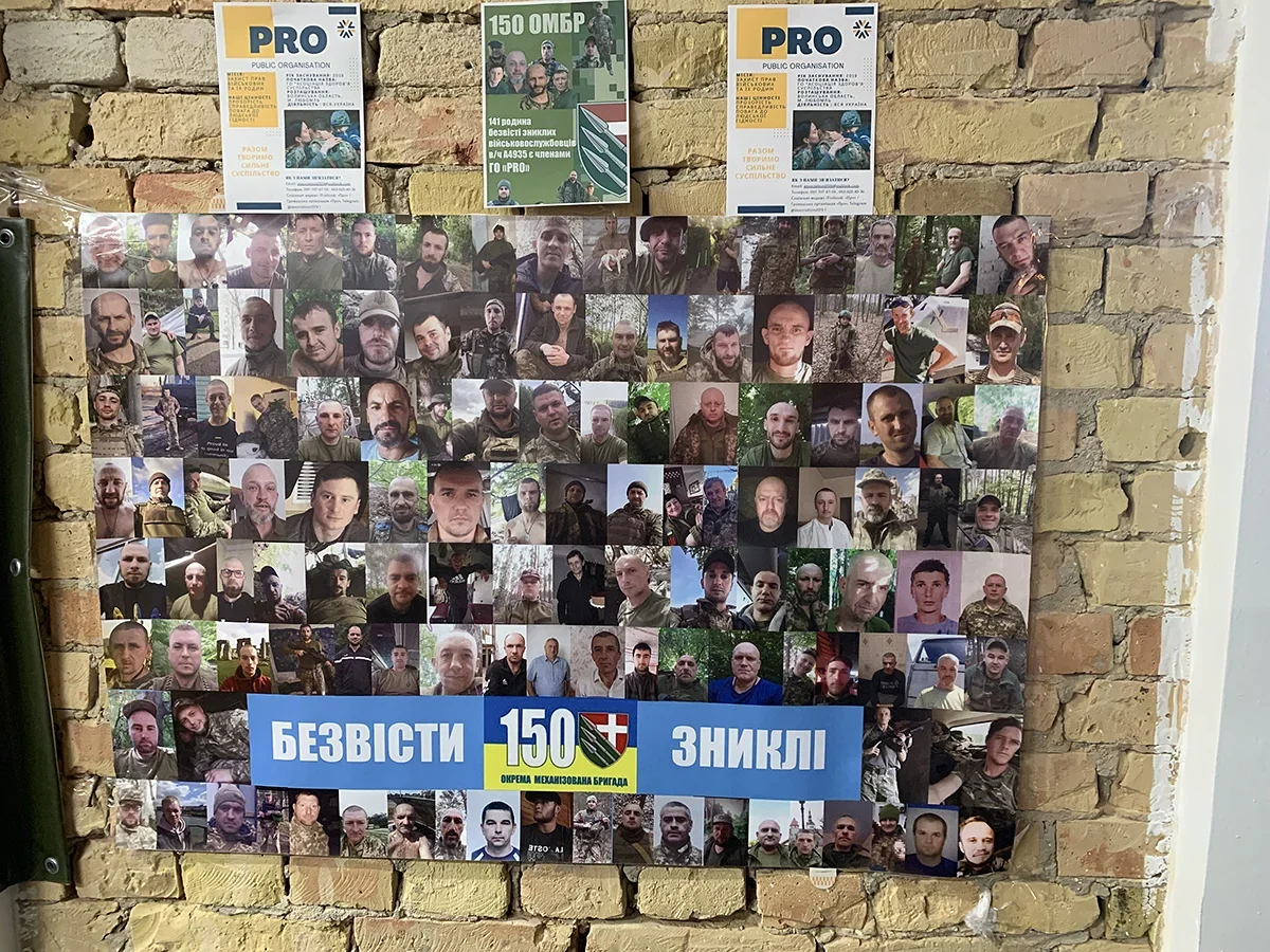 A collage of photos of missing Ukrainian soldiers is displayed at a conference in Kyiv, Ukraine, 10 December 2024. Photo: Olga Musafirova