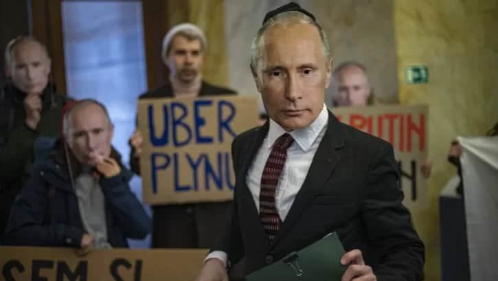 A protest rally against banks supporting Russia’s fuel industry. Prague, April 2022. Photo: EPA-EFE / MARTIN DIVISEK