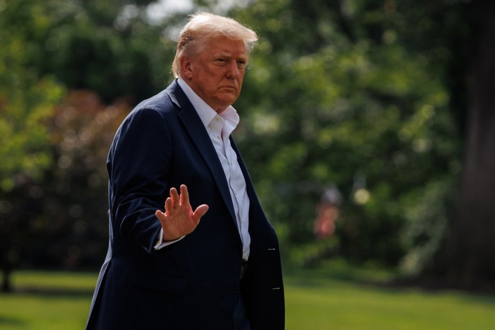 Donald Trump walks across the South Lawn of the White House on 11 July 2025. Photo: EPA/SAMUEL CORUM / POOL
