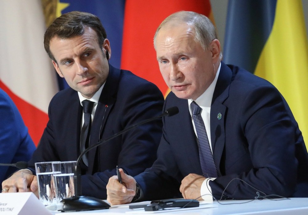 Emmanuel Macron and Vladimir Putin give a press conference after a summit on Ukraine at the Élysée Palace, in Paris, France, 9 December 2019. Photo: EPA-EFE/LUDOVIC MARIN / POOL