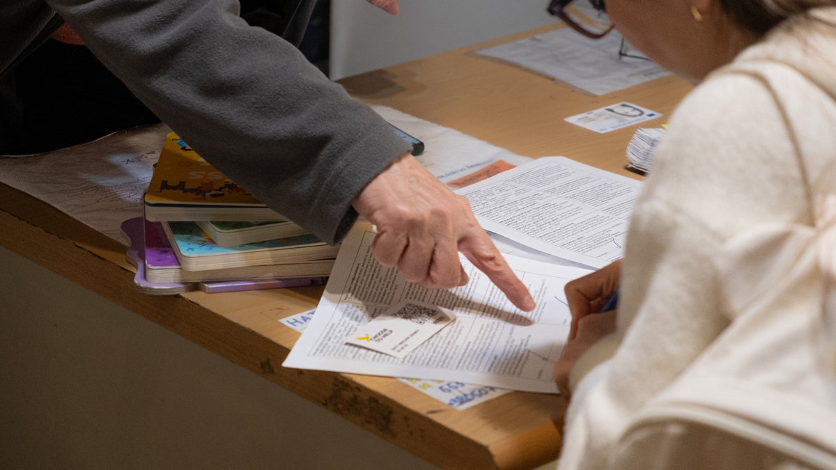 Работа по регистрации украинцев. Фото: Дмитрий Вепрев