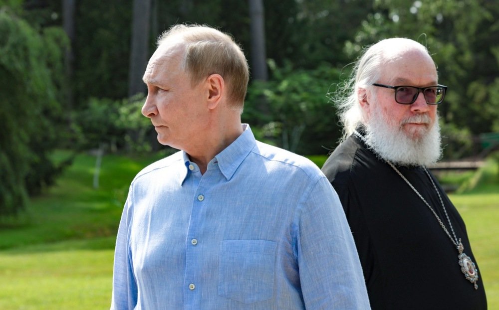Vladimir Putin and an Orthodox monk are pictured at the Smolensk Skete in the historic Valaam monastery in Karelia, Russia, 1 August 2025. EPA/GAVRIIL GRIGOROV/SPUTNIK/KREMLIN POOL