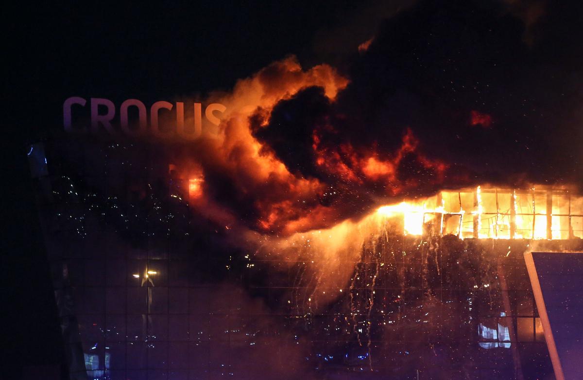 Fire rises above the burning Crocus City Hall concert venue outside Moscow, 22 March 2024. Photo: EPA-EFE/VASILY PRUDNIKOV