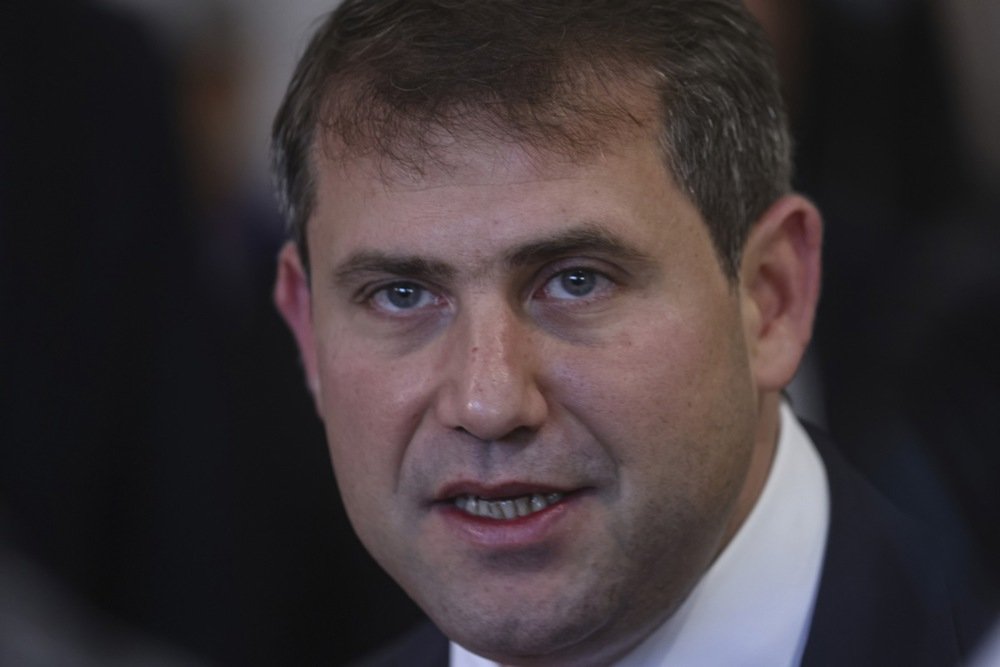 Ilan Shor speaks during the opening of a store of the Moldovan trading house Eurasia in Moscow, Russia, 17 September 2024. Photo: EPA/SERGEI ILNITSKY