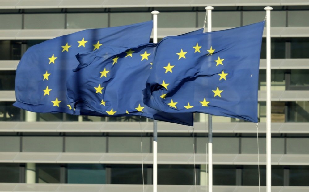 Flags of the European Union in front of a building at the European Parliament in Strasbourg, France, 2 April 2025. Photo: EPA-EFE/RONALD WITTEK