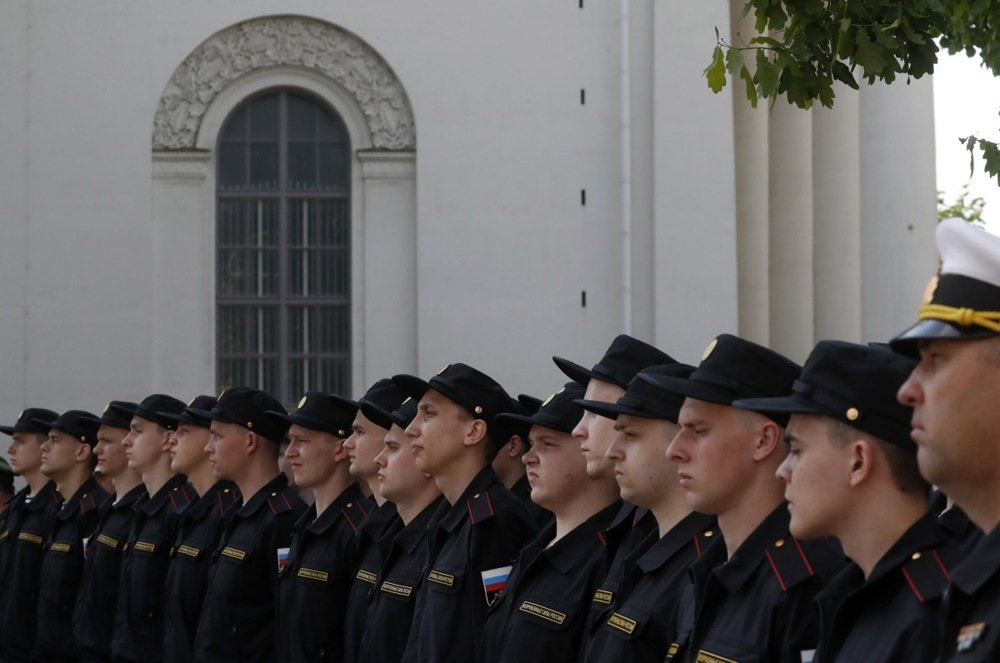 Young Russian marine recruits attend a departure ceremony to join the army in front of the Trinity Cathedral in St. Petersburg, Russia, 23 May 2023. Photo: EPA/ANATOLY MALTSEV