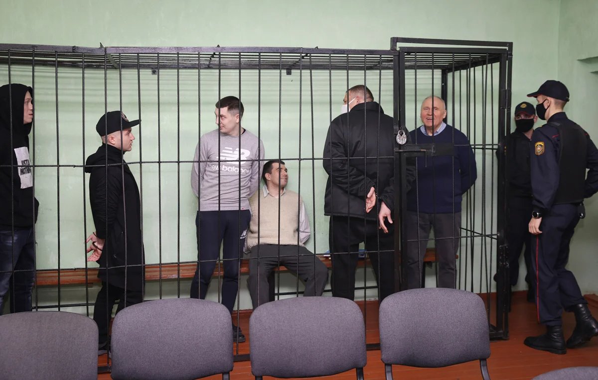 Tsikhanouski, with back to camera, in court in Homyel, Belarus, 14 December 2021. Photo: Sergey Kholodilin / BelTA / AP / Scanpix / LETA